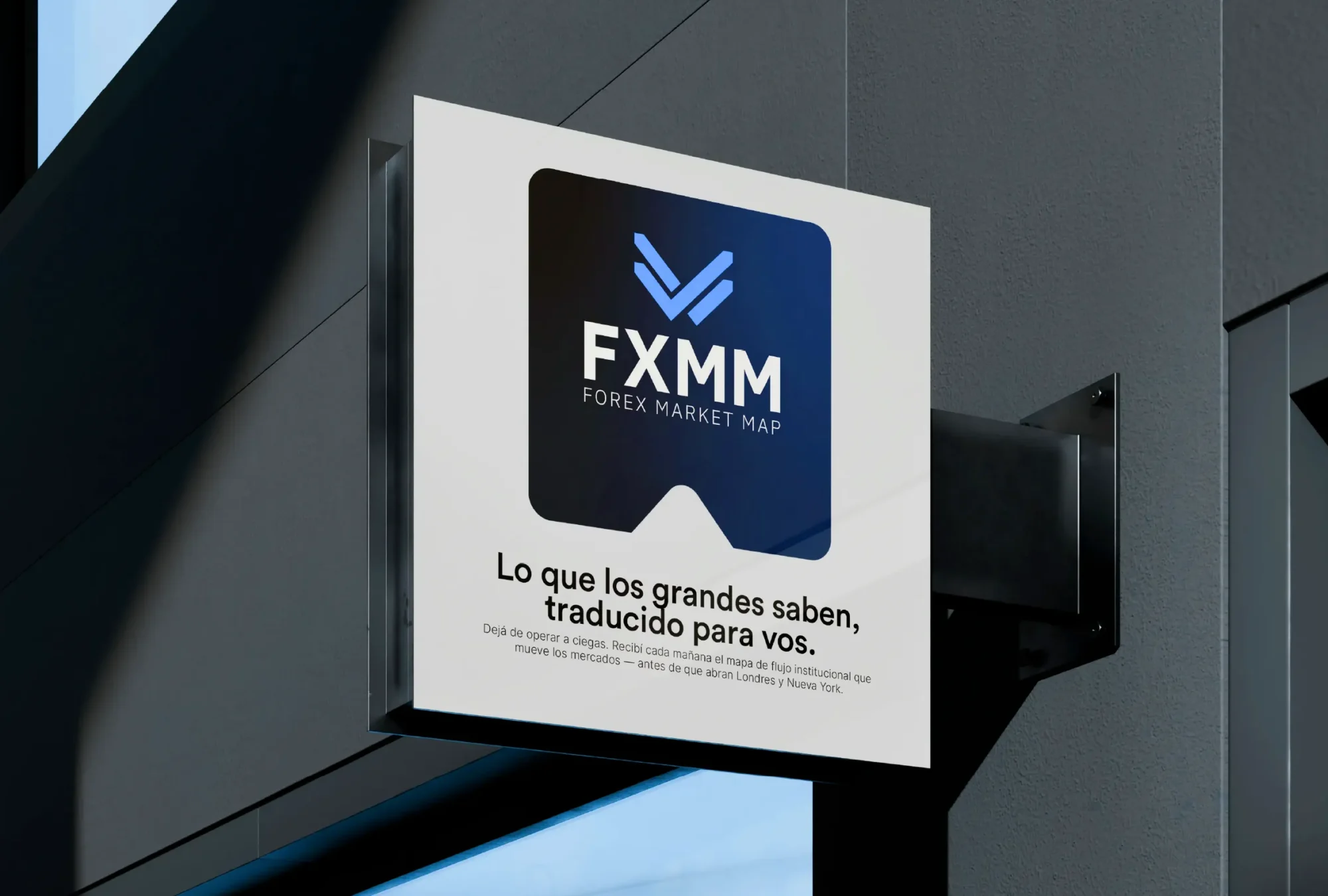 Hanging sign with the FXMM brand on a building front